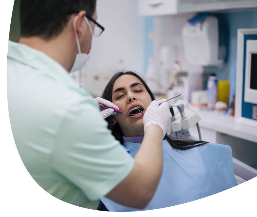 girl and doctor smiling